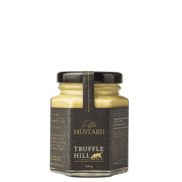 A hexagonal glass jar with a black label branded Truffle Hill. Label describes Truffle Mustard