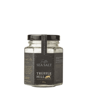 Hexagonal jar with a black label . Truffle Hill Truffle Sea Salt.